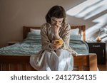 Nervous, stressed teen girl in glasses reading messages in smartphone feeling bad, humiliated. Depressed frustrated woman receive negative message in social media from haters. Cyberbullying, stalking.