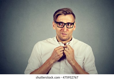 Nervous Stressed Young Man Student Feels Awkward Looking Away Sideway Anxiously Craving Something Isolated Gray Wall Background. Human Emotion Face Expression Feeling Body Language