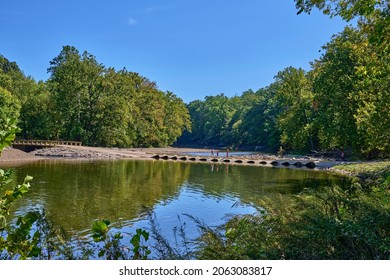 Neshaminy Creek In Tyler State Park In Bucks County,Pennsylvania USA. Looking At A Downstream Panorama  With A Beautiful Blue Sky. 