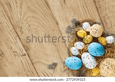 Nest with Easter holliday eggs on the table