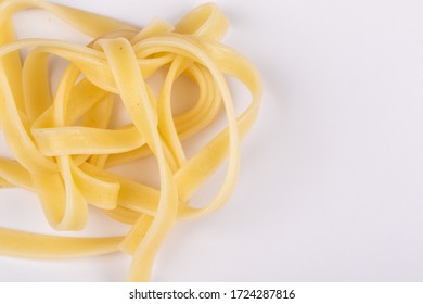 Nest Of Fresh Linguine Pasta On White Background.