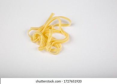 Nest Of Fresh Linguine Pasta On White Background.