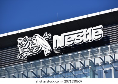 Nestle Logo, Signage On The Facade Of Nestle Polska Office, Swiss Food And Drink Company. WARSAW, POLAND - NOVEMBER 1, 2021