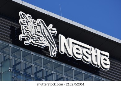 Nestle Logo, Signage On The Facade Of Coty Eastern Europe Office, Swiss Food And Drink Company. WARSAW, POLAND - NOVEMBER 1, 2021