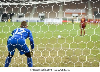 Net In The Football Goal Penalty Shootout In The Background.