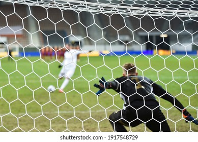 Net In The Football Goal Penalty Shootout In The Background.