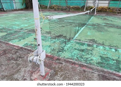 The Net That Had Started To Break Down On The Broken Tennis Court