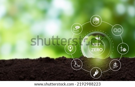 Net zero and carbon neutral concept. Greenhouse gas emissions target. Low carbon emissions. Climate neutral long term strategy. Limit  global warming.  Net zero on green view background.