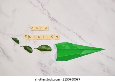 Net Zero And Carbon Neutral Concepts Net Zero Emissions, With A Paper Airplane.