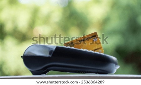 Net Zero and Carbon Neutral Concepts Net Zero Emissions Goals.   Electronic Data Capture( EDC ) with credit card concept Net zero carbon credit.