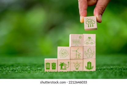 Net zero greenhouse gas emissions reduction with carbon credit concept. Reduce carbon dioxide e.g. renewable energy production improve the efficiency of transportation reduce environmental pollution. - Shutterstock ID 2212646033