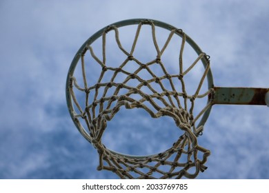 Netball Hoop Against Cloudy Blue Sky