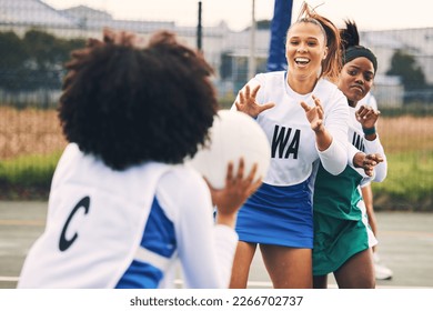 Netball, sport and women in a match or game being competitive in a competition on a court as teammates. Training, fitness and female athletes happy for high school sports and exercise as a team - Powered by Shutterstock