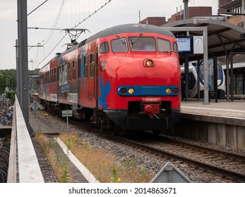 Netherlands - 4 july 2021, Hilversum: Historical train 'de Karel' drives along Hilversum train station in the Netherlands. Anniversary ride.