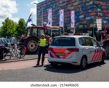 Netherlands - 4 july 2022, Hilversum: farmers in conversation with police at protest against nitrogen policy at MEDIA PARK