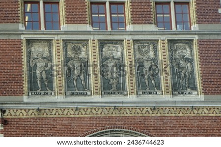 Netherlands, Amsterdam, Museumbrug, Rijksmuseum, sculptures on the facade of the building