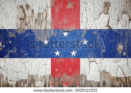 Netherlands Antilles flag and paint cracks. Prison concept with border image. Netherlands Antilles is currently heading toward recession. Inflation. employment. economic recession.