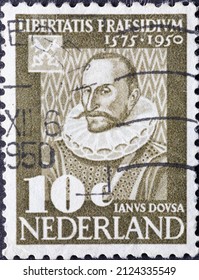 Netherlands - circa 1950 : a postage stamp from the Netherlands , showing a portrait of Janus Dousa(1545-1604), first librarian of Leiden University 