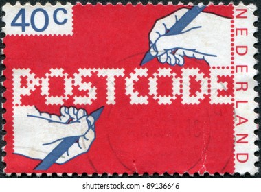 NETHERLANDS - CIRCA 1978: A Stamp Printed In The Netherlands, Dedicated To The Introduction Of New Postal Code, Shows The Hand Of A Writing Text, Circa 1978