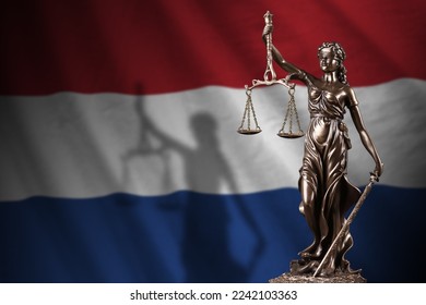 Netherlands flag with statue of lady justice and judicial scales in dark room. Concept of judgement and punishment, background for jury topics - Shutterstock ID 2242103363