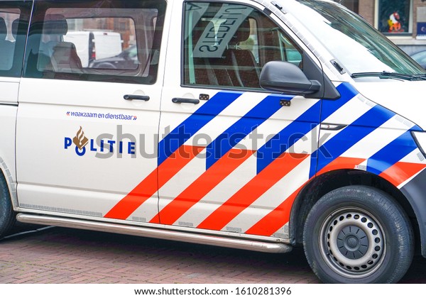 A Netherlands police car with text and logo. Nobody\
in the vehicle. 7 September 2018. Rotterdam. Netherlands           \
                       