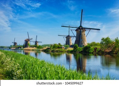 Netherlands rural lanscape with windmills at famous tourist site Kinderdijk in Holland