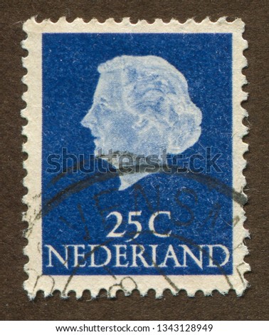 Netherlands stamp no circa date: a stamp printed in Netherlands shows Queen Juliana illustration.