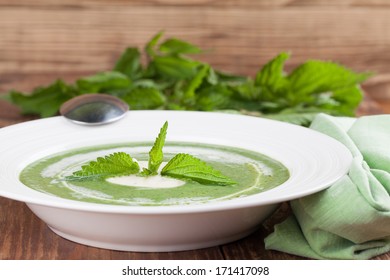Nettle Cream Soup With Sour Cream. Shallow Dof