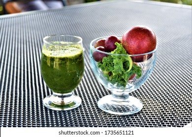 Nettle Juice And Fruit In A Glass Goblet