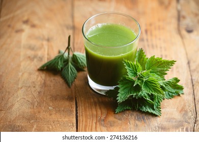 Nettle Leaves And Glass Of Nettle Juice