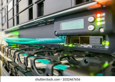 Network 10G interfaces of the central router. Fiber-optic wire is connected to the main server. Server room is the data center.