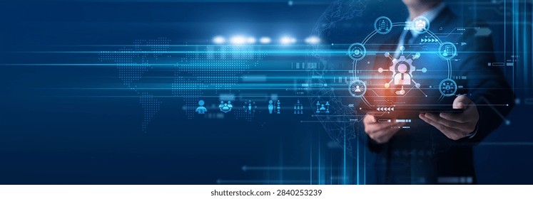 Network administrator using tablet analyzing network administration tools and traffic flow. Network administration monitoring, system uptime and infrastructure control.