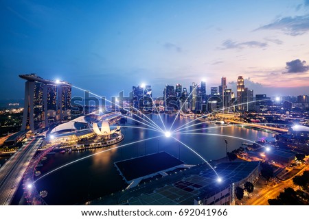 Network business conection system on Singapore smart city scape in background.Network business conection concept 