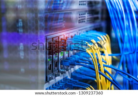 network cable connecting on network core switch close up