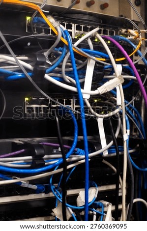 Network cable in server farm. Maintenance of complex network infrastructure in the office