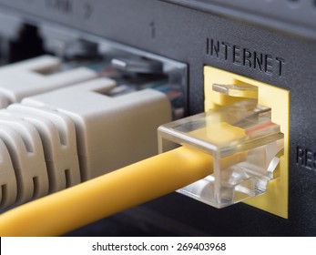 Network Cables Connected To A Router Or Modem