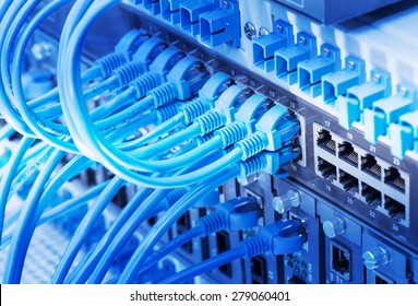  network cables connected to switch - Shutterstock ID 279060401