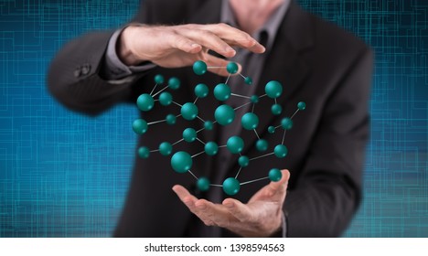 Network concept between hands of a man in background