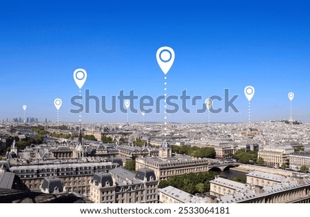 Network connection concept. Aerial view on old houses in Paris and location pins. Global positioning system pin map. Map pins with Paris, France. Aerial town view from Cathedral Notre Dame de Paris