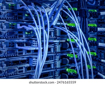 Network connection technology with network switch router, ethernet cables and status LED to show working status of data center equipment in mobile telecommunications 5G central node - Powered by Shutterstock