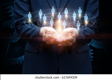 Network of consumers in the hands of a businessman. - Shutterstock ID 617699339