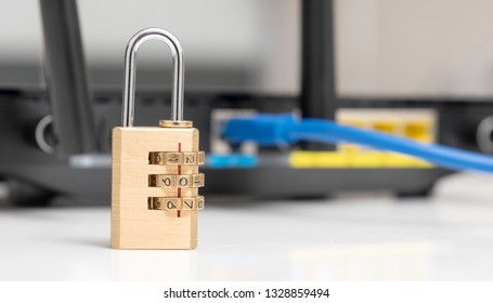 Network and data protection concept with padlock. Internet router or switch with cable plugged in. - Powered by Shutterstock - Get 15% off with code: PIKWIZARD15