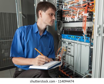 Network engineer in server room