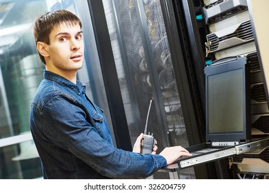 network engineer working in server room