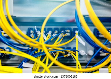 Network hub and patch UTP LAN cables in rack cabinet, close up - Powered by Shutterstock - Get 15% off with code: PIKWIZARD15