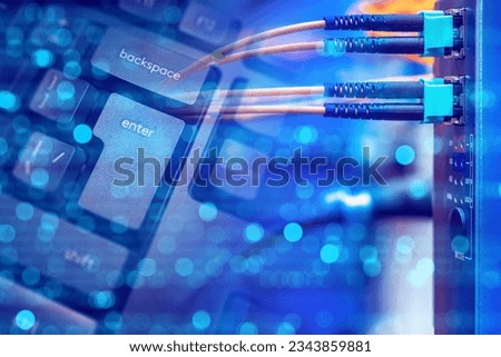 Network infrastructure. Wires near keyboard. Internet equipment. Internet provision. Network fiber optic cables. Fragment of keyboard close-up. Network equipment for enterprise. Internet technologies