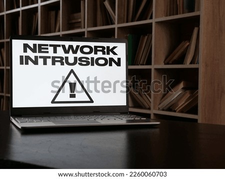 Network intrusion is shown using a text