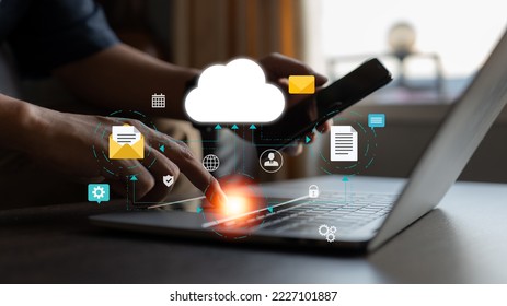A network of mobile devices and laptops for cloud computing. A database with a company icon is filled with information and data from online devices.
