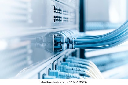 Network panel, switch and cable in data center - Shutterstock ID 1168670902
