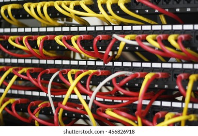 Network Panel, Switch And Cable In Data Center, Ethernet Cables, Server Rack. Security, Protection, Firewall. Network Cables Installed In The Rack. Network Server. UTP Cat5e Cable With Patch Panel.